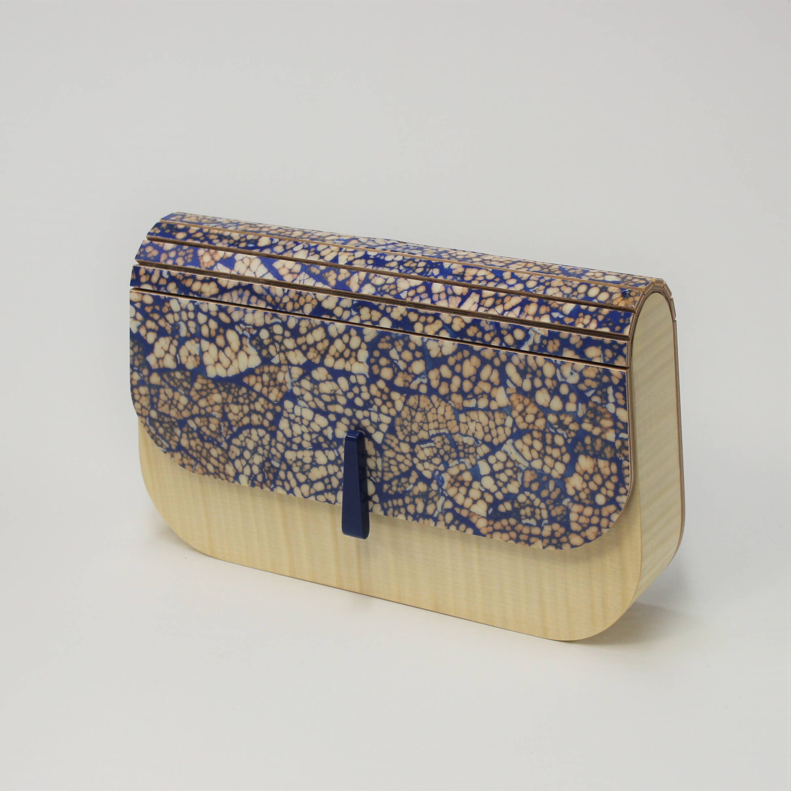 Minaudière en coquille d’œuf